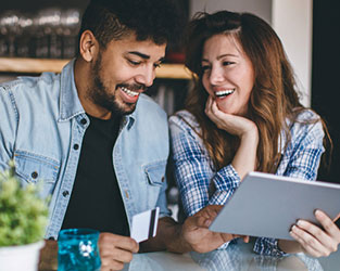 Couple checking their credit scores